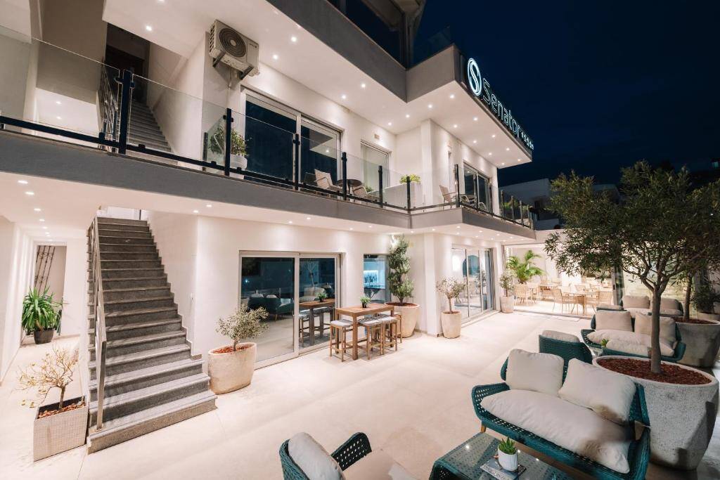 Terrace and lounge area of Hotel Senator Lux at night